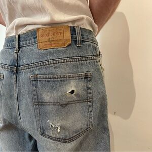 Relaxed Light Blue Men's Jeans with Subtle Distressing